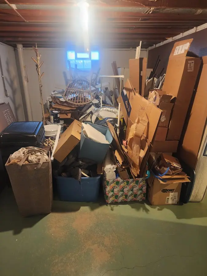 Roll-off dumpster container at job site for Construction Dumpster Rental in Bloomington